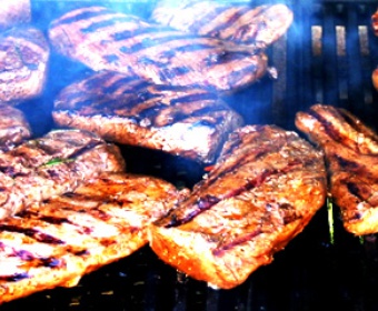 professional bbq with meat meat on the grill