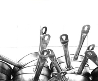 stacked pans in professional kitchen PS stacked pans